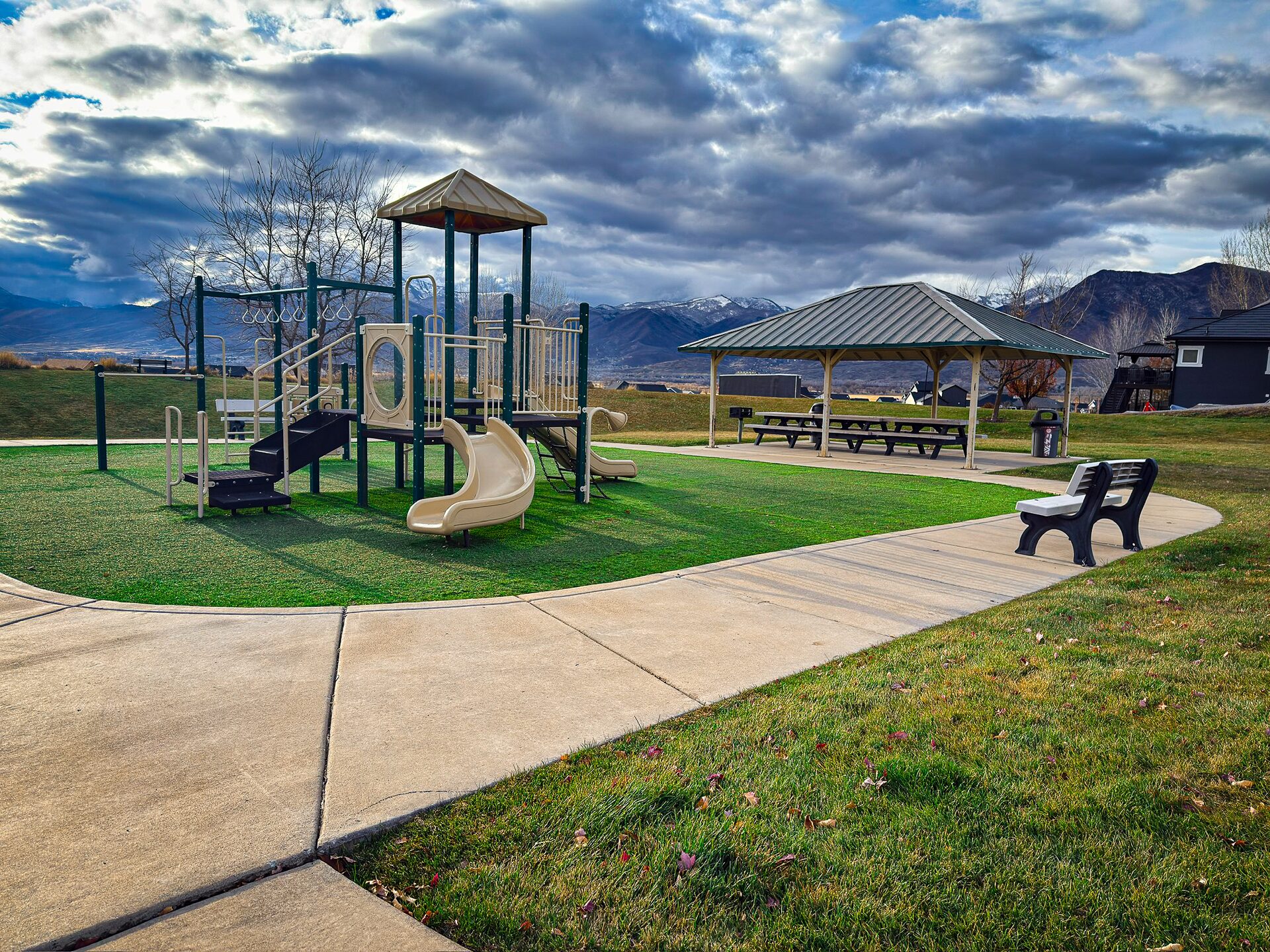 Community park and playground in Heber City Utah with mountain views and pavilion